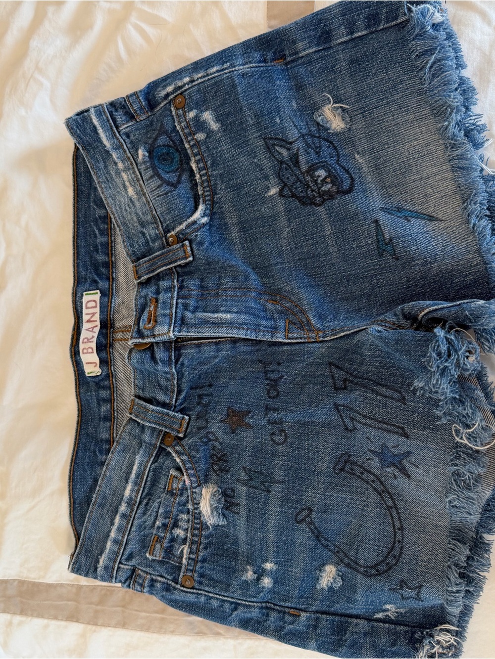 J Brand Distressed Blue Denim Shorts with Printed Graphics